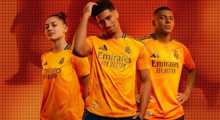 قميص ريال مدريد بطلته الجديدة باللون البرتقالي