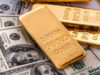 الذهب يتراجع هامشياً مع صعود الدولار وترقّب قرار الفائدة الأميركي