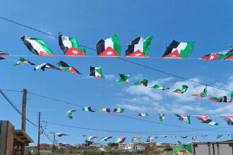 جرش توزع 44 ألف علم احتفاء بيوم