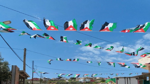 جرش توزع 44 ألف علم احتفاء بيوم