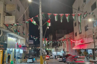 كفرنجة توزع 5 آلاف علم احتفالا بيوم العلم