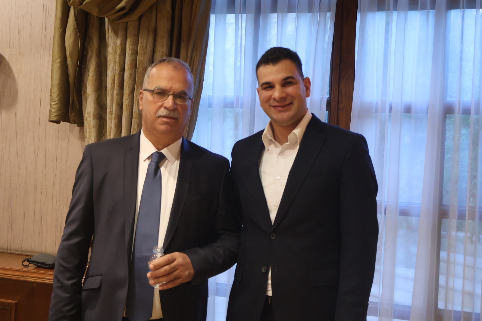 نادي الملك حسين يشهد مصاهرة ونسب بين آل الراميني وآل النعيمي بحضور وجهاء واقرباء واصدقاء العائلتين "شاهد الصور"