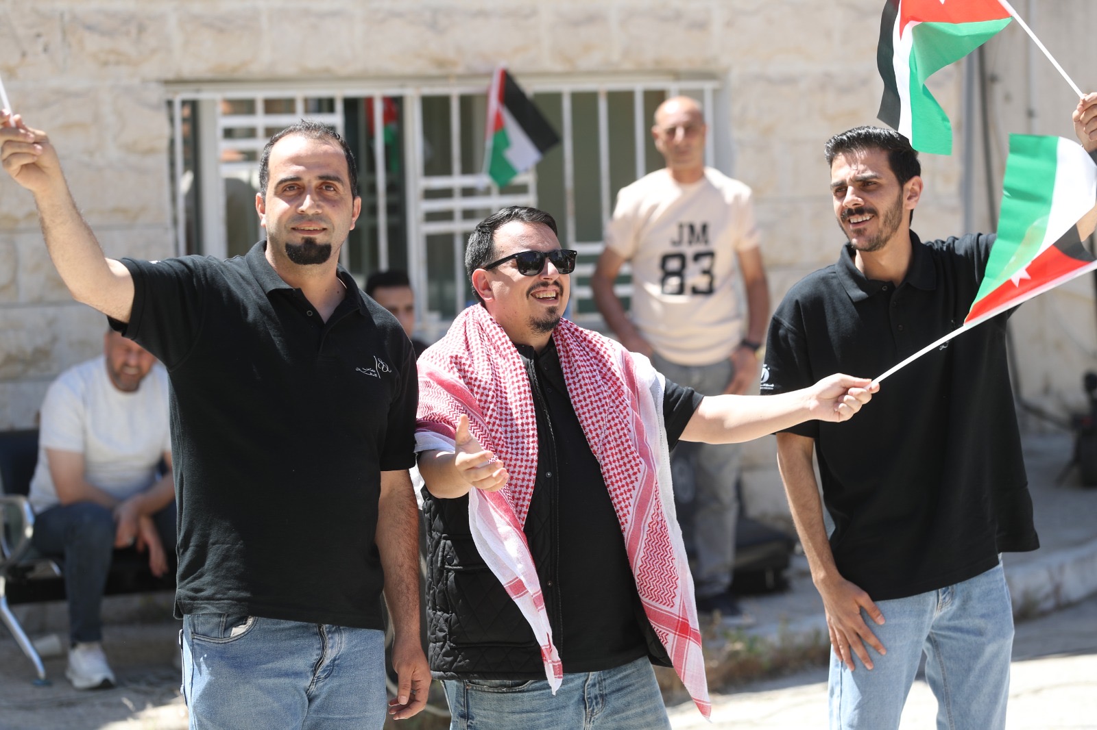 موظفو الأسواق الحرة الأردنية يحتفلون بعيد الاستقلال الـ80