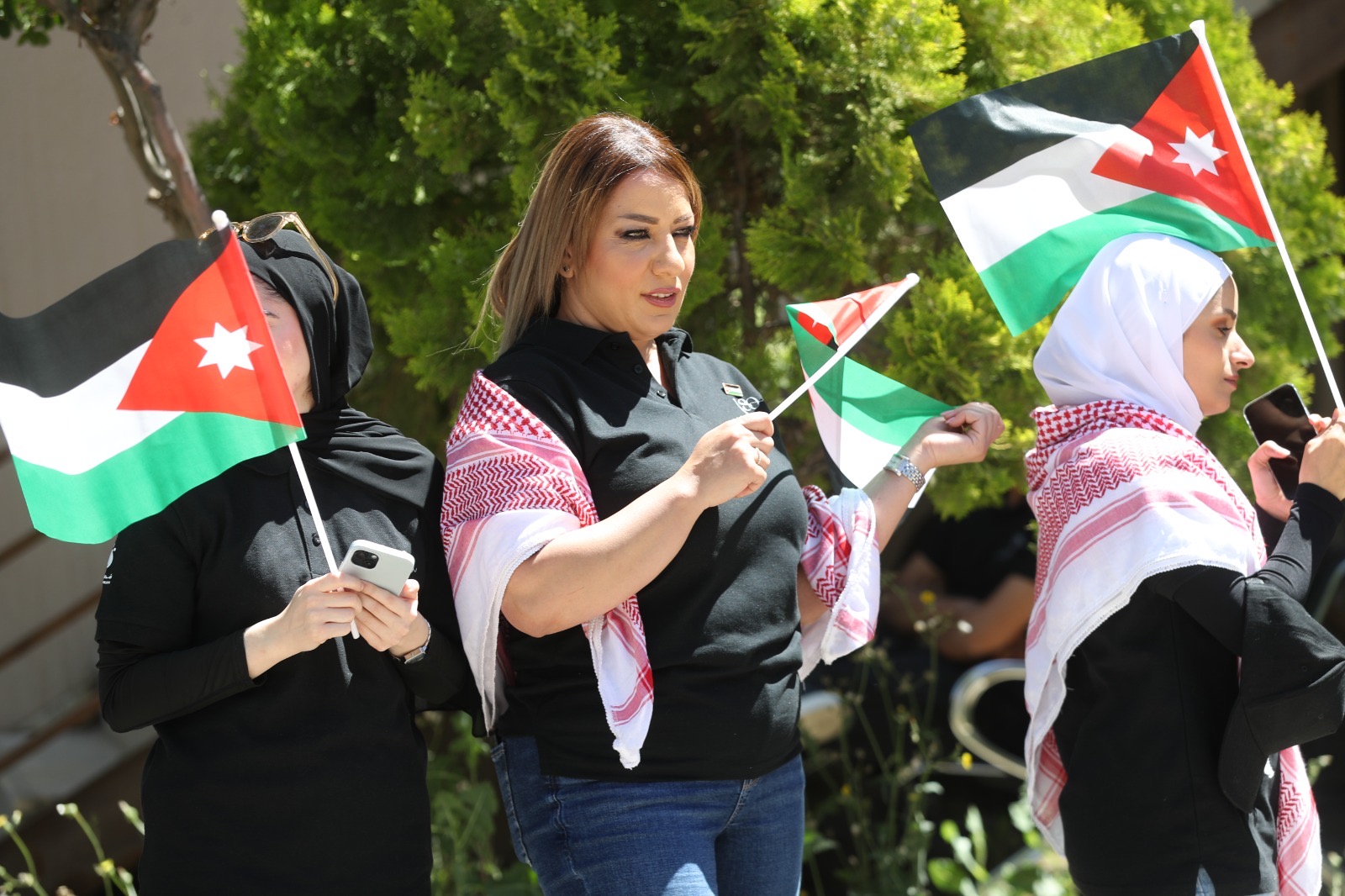موظفو الأسواق الحرة الأردنية يحتفلون بعيد الاستقلال الـ80