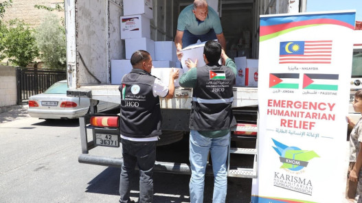 توزيع 10 آلاف طرد غذائي وصحي على لاجئي فلسطين في مخيمات المملكة
