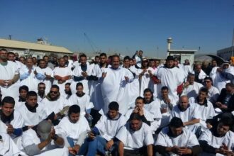 بالأكفان .. موظفو التخليص يرفعون صوتهم: الطريق الخلفي في العقبة يهدد الأرواح