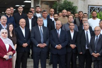 وزارة الطاقة تنفذ وقفة تضامنية مع أسر شهداء كنيسة حمود في الكرك